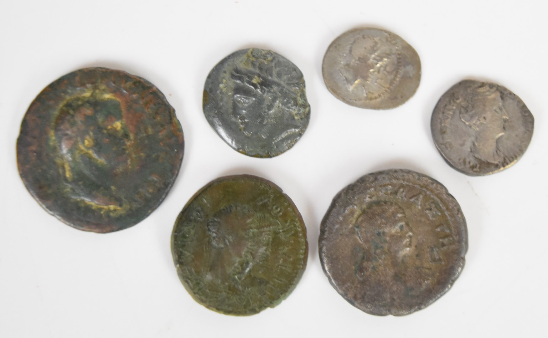 A collection of twelve Roman coins including two silver examples Diocletian follis, Phillip II, - Image 4 of 5