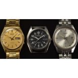 Three Seiko gentleman's wristwatches 7005-8062 with luminous hands, silver dial and stainless