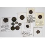 A collection of twelve Roman coins including two silver examples Diocletian follis, Phillip II,