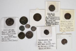 A collection of twelve Roman coins including two silver examples Diocletian follis, Phillip II,