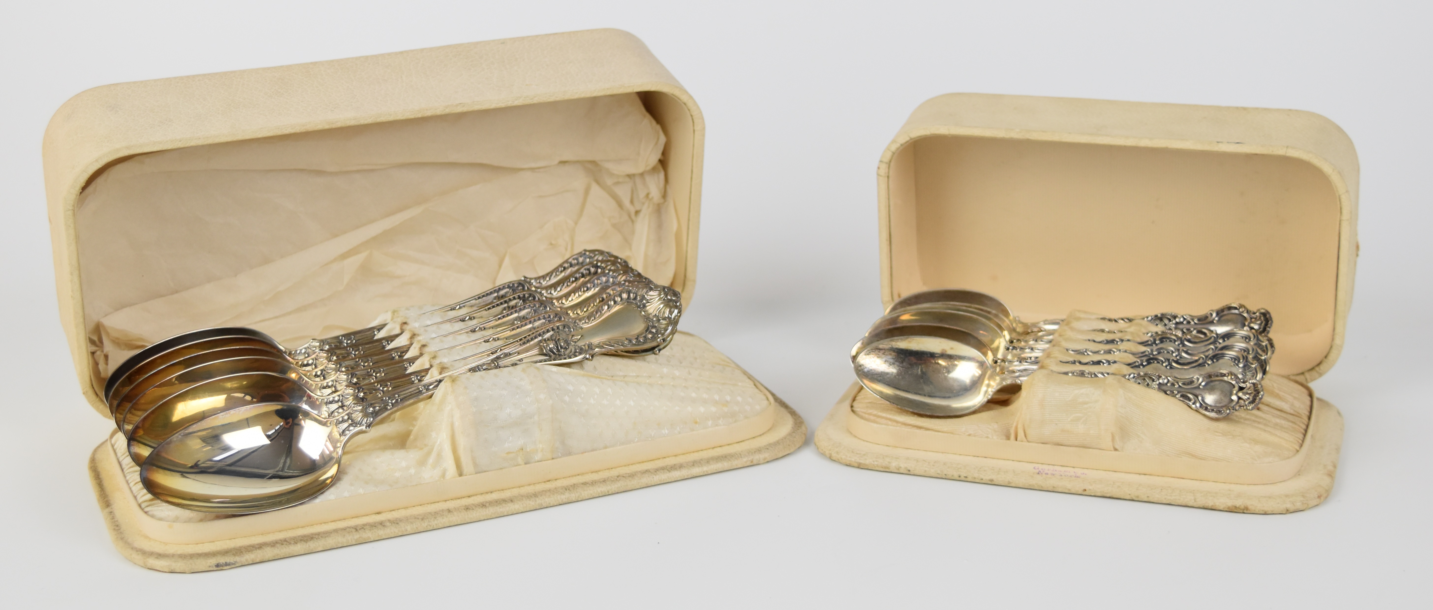 Two cases of Gorham and similar American silver spoons, comprising six table spoons and six
