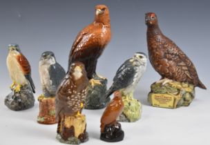 Seven Royal Doulton novelty Beneagles Scotch Whisky bird decanters, all with contents except the