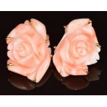 A pair of 18ct gold earrings each set with a carved coral flower, 17.2g,