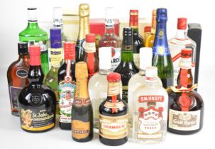 Twenty bottles of wine, spirits and liqueurs including Oudinot and Heidsieck & Co Monopole