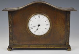 Liberty & Co. London Arts & Crafts mantel clock, with hammered and riveted decoration, having