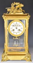 Victorian Henry Marc gilt four glass mantel clock with Brocot escapement, enamel dial, striking on a