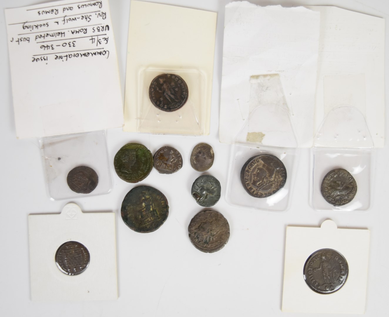 A collection of twelve Roman coins including two silver examples Diocletian follis, Phillip II, - Image 5 of 5