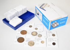 A collection of Victorian coinage in packs, including half crowns, William III 6d, Charles II