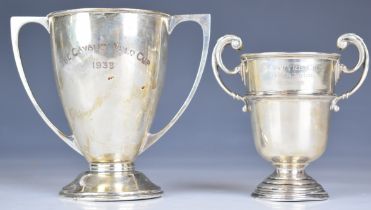 Two George V hallmarked silver twin handled trophy cups, one Mappin & Webb, Sheffield 1939, engraved