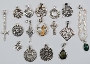 Sixteen silver pendants including nine in a Celtic design, one set with labradorite, etc