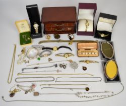 A collection of jewellery, some silver including bangle, bracelet, locket, rope twist necklace and