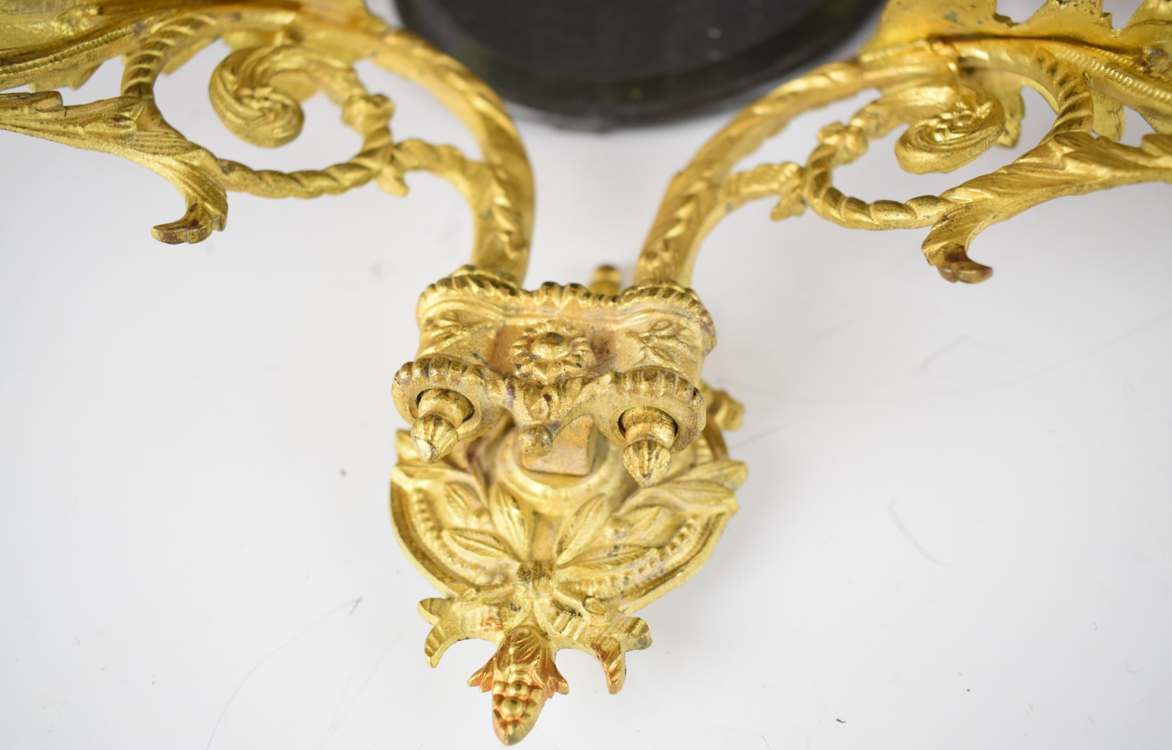 19thC gilt metal and cranberry glass wall sconce or lamp, with bevelled mirror back and twin arms, - Image 5 of 7