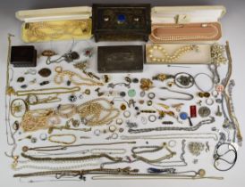 A collection of costume jewellery including Excalibur silver locket, silver pendant in the form of a