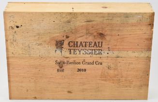 Six bottles of Chateau Teyssier Saint-Emilion Grand Cru red wine, 2010, 75cl, in sealed wooden case.