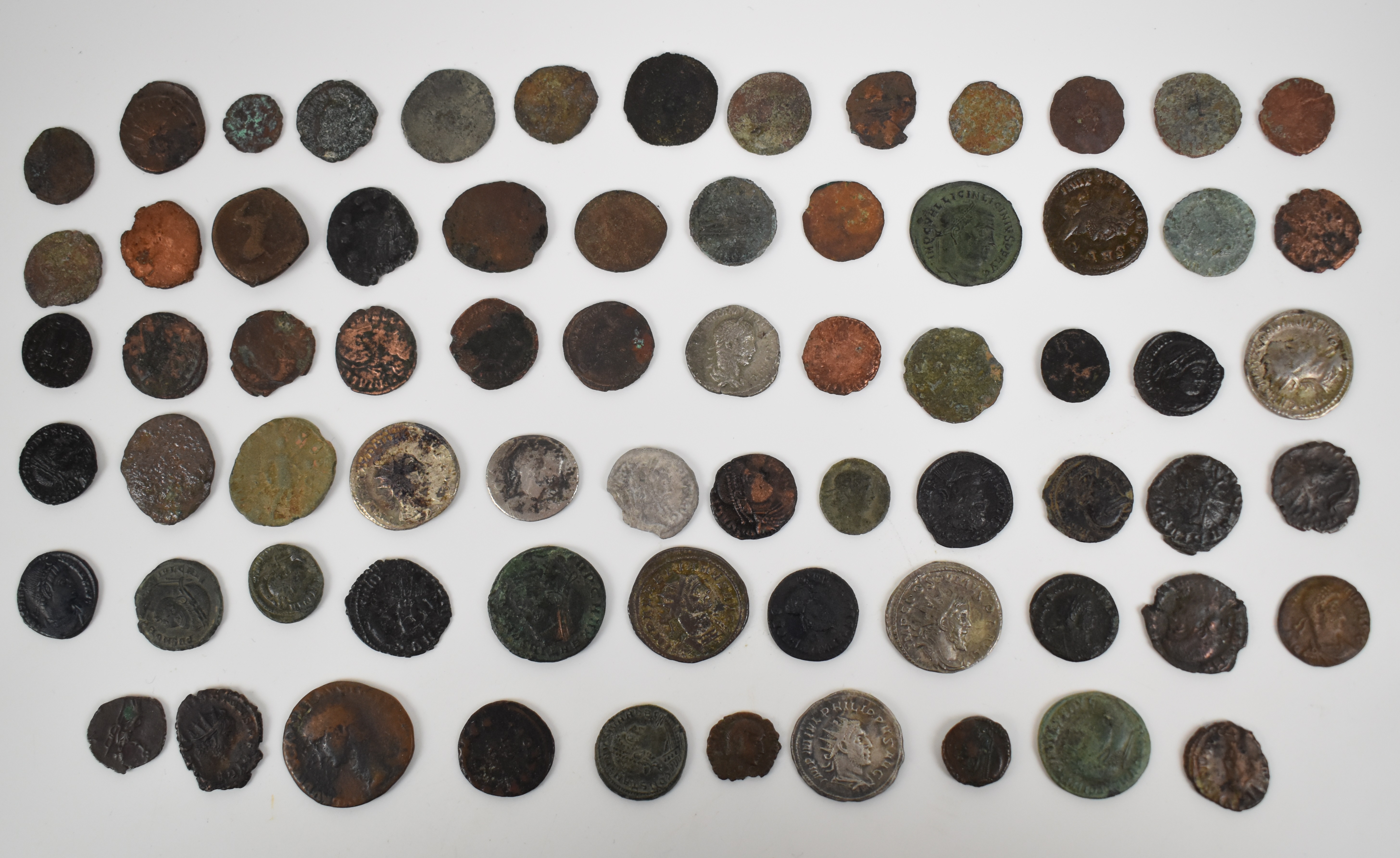 Seventy bronze / copper Roman coins, metal detector finds, all in an indexed wooden collector's