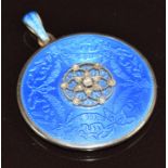 Asprey pendant/ locket set with blue enamel and diamonds to the centre, verso a locket