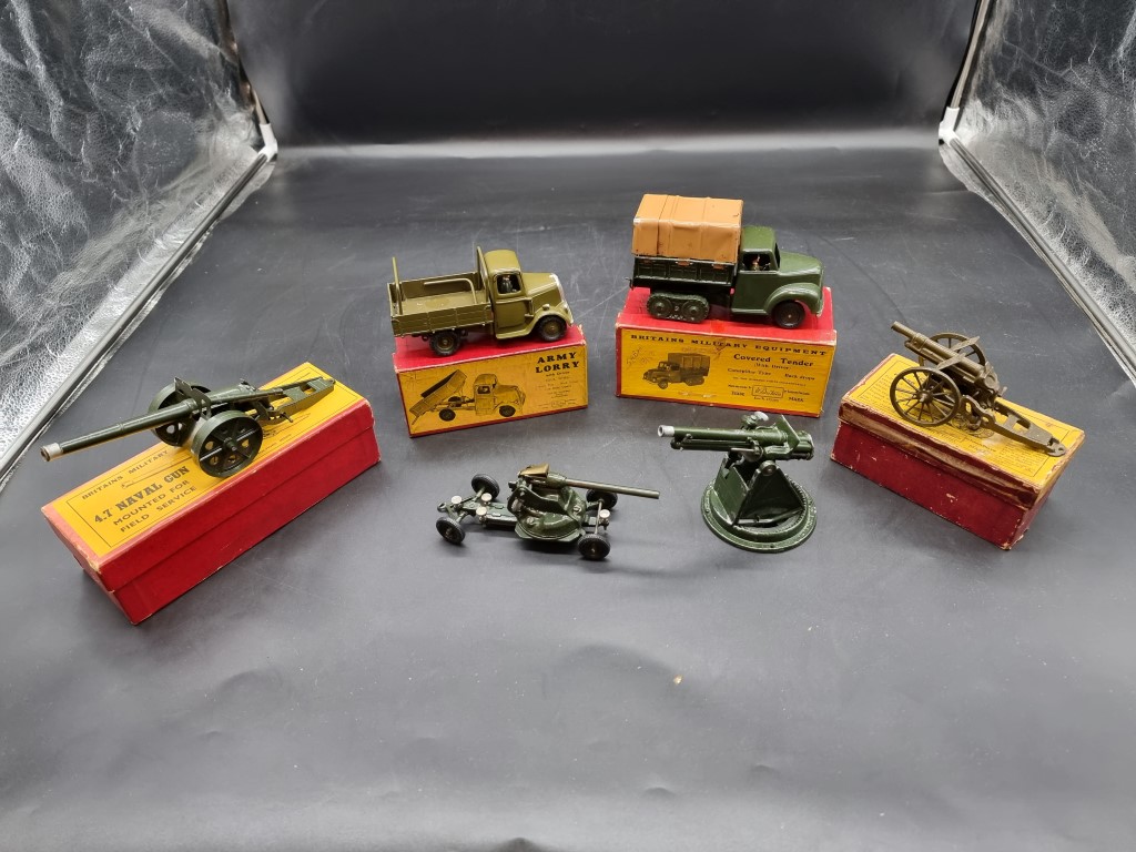 Britains: four vintage boxed military vehicles and guns, comprising Nos.1264; 1433; 1334; 1201;