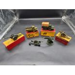 Britains: four vintage boxed military vehicles and guns, comprising Nos.1264; 1433; 1334; 1201;