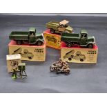 Britains: three vintage military vehicles, comprising: Army Lorry No.1334 (x2); a Beetle Lorry No.