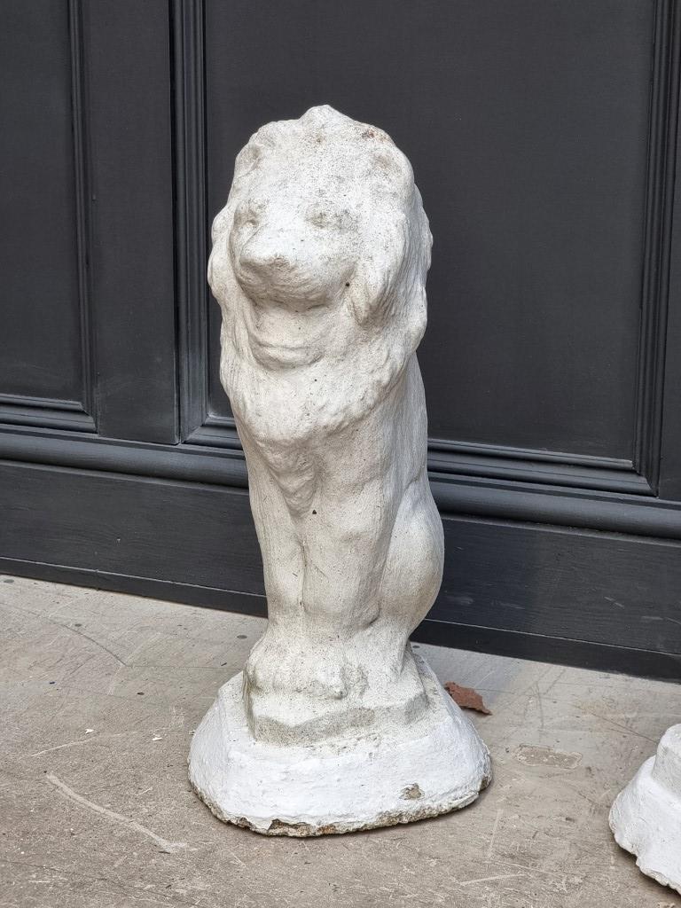 A pair of white painted composition stone lion gate pier finials, 56cm high. - Image 2 of 6