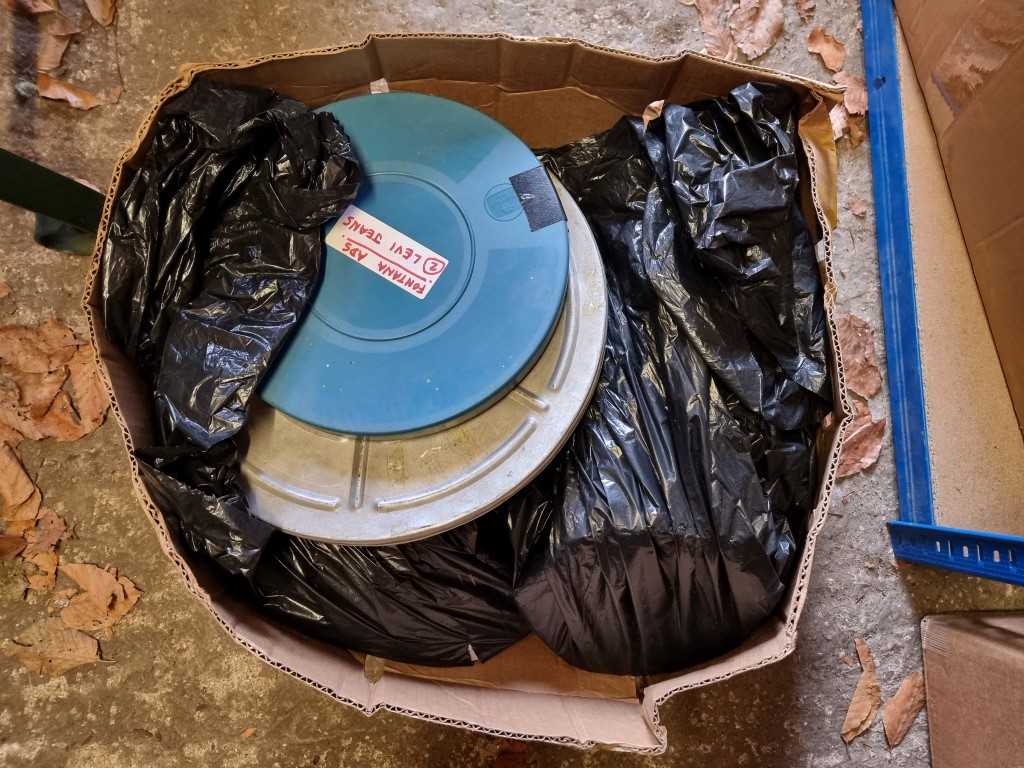 A large quantity of 16mm film reels, in tins. (4 boxes). - Image 5 of 6