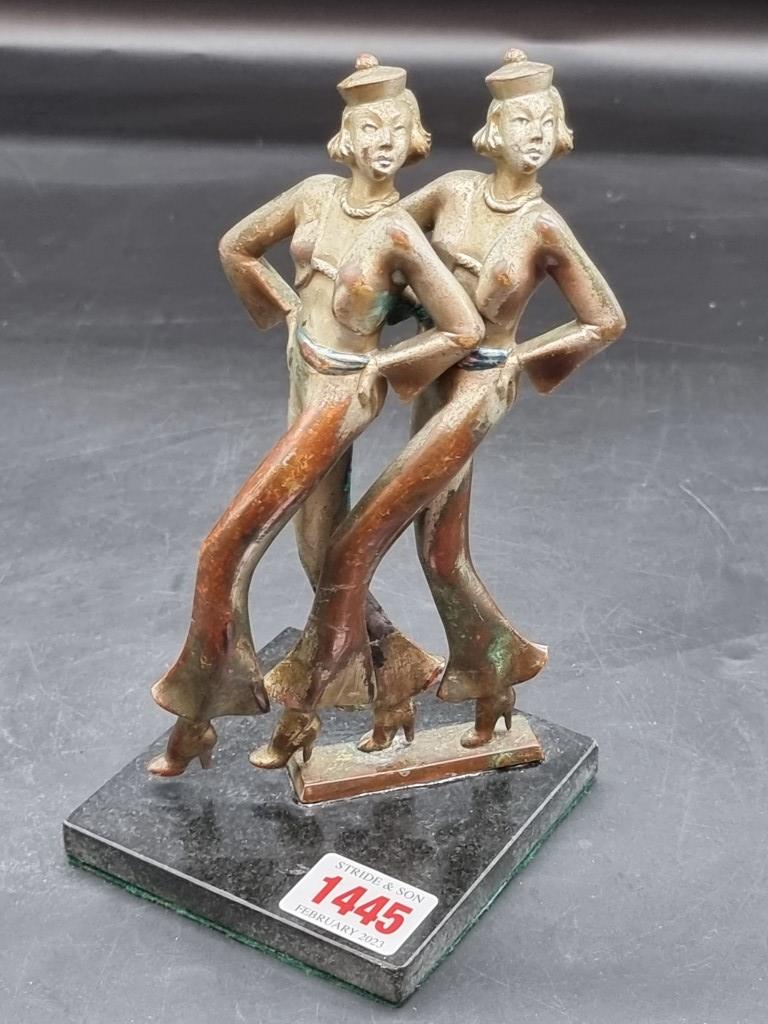 An Art Deco cold painted bronze figure group of two dancers, 20cm high.