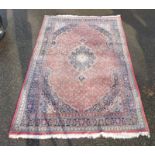 A Persian style carpet, 274 x 176cm.