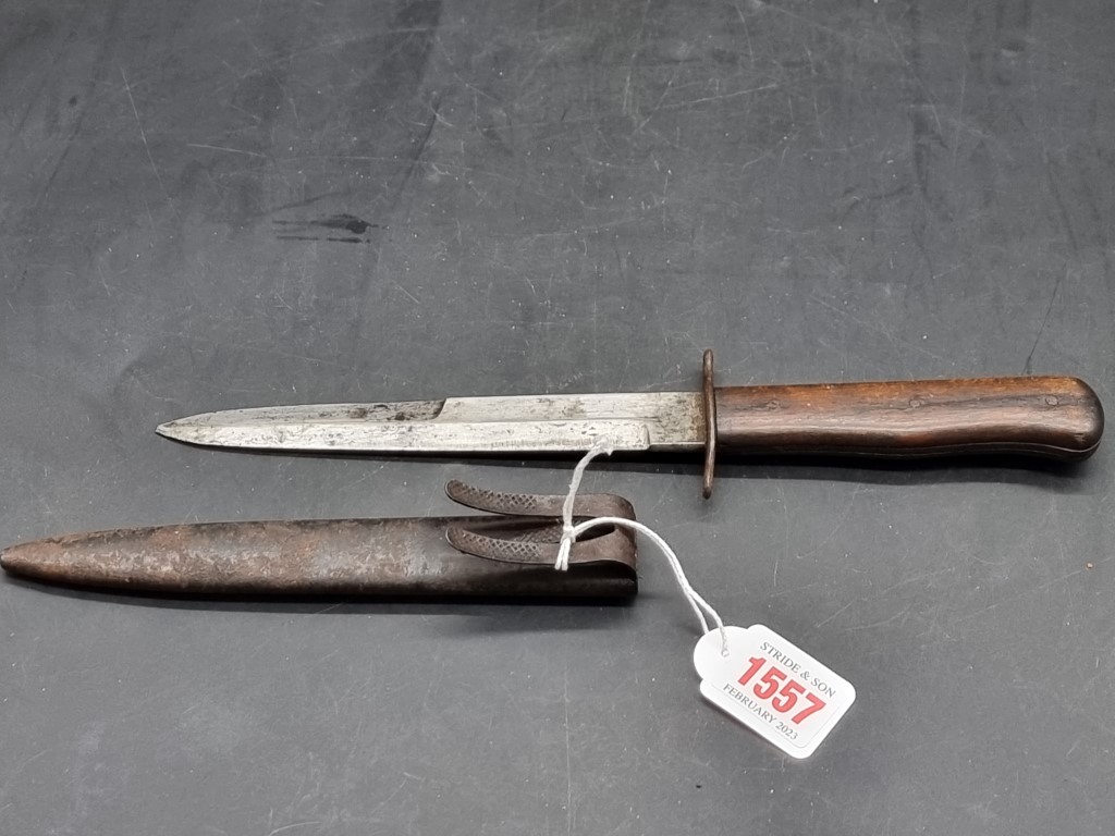 A World War II Luftwaffe boot knife and sheath, the blade inscribed '5'. - Image 3 of 3