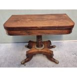 A William IV rosewood pedestal card table, with unusual brass push button lock mechanism, 91cm wide.