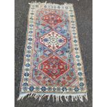 A Caucasian rug, 194 x 102.5cm.