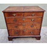 An 18th century walnut, feather and crossbanded chest of drawers, 94.5cm wide.