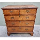 A George III oak and walnut crossbanded chest of drawers, 93.5cm wide.
