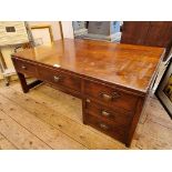 An Oriental elm low table, 35cm high x 90.01cm wide.