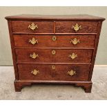 An 18th century oak panelled chest of drawers, 87cm wide.