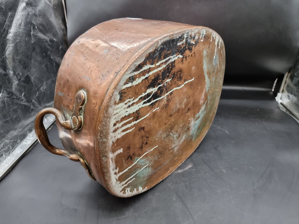 A large Victorian copper twin handled pan or kettle, inscribed 'Keswick Hotel Co', 57cm wide. - Image 4 of 4