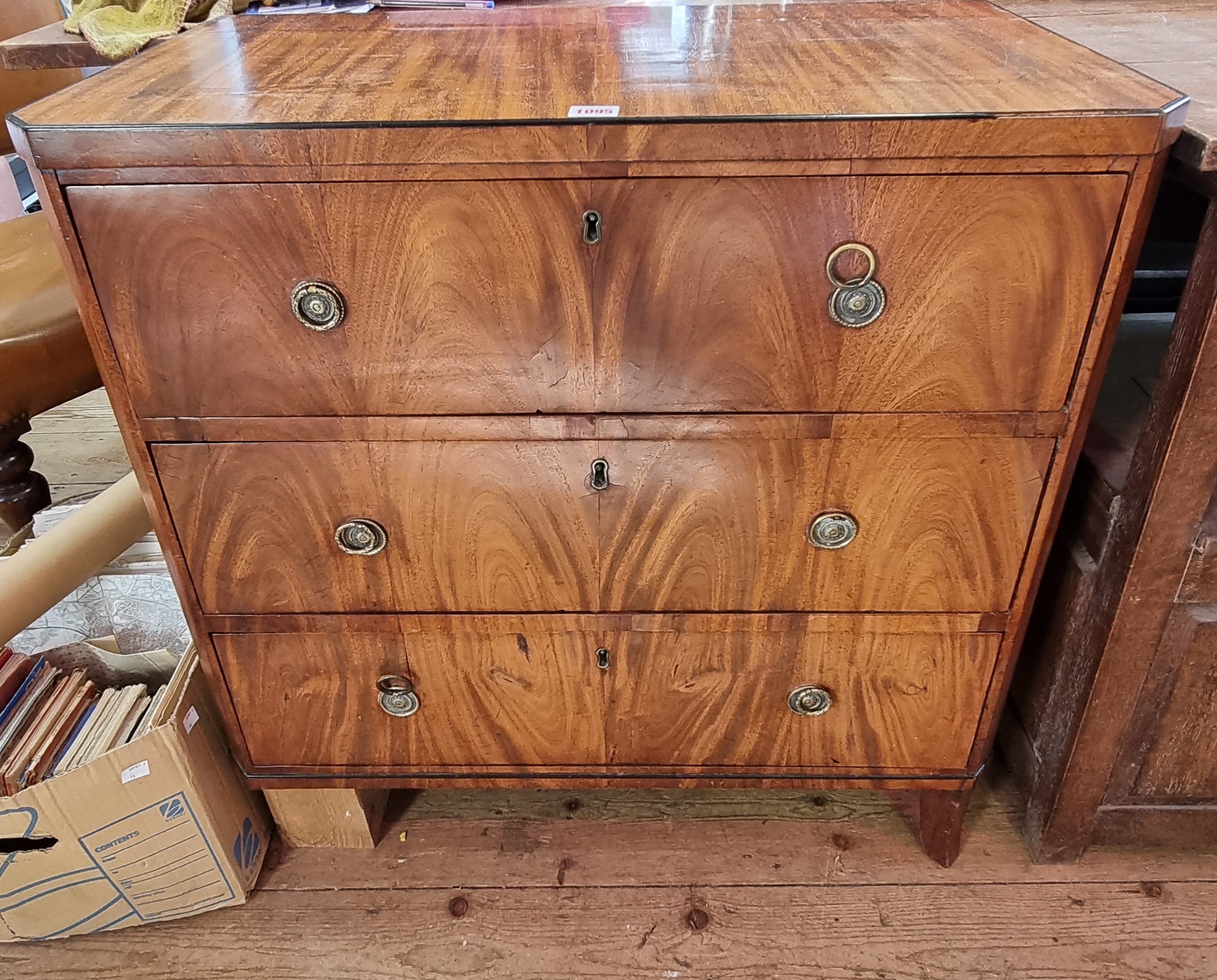 A late 18th century Continental mahogany three drawer chest, possibly Biedermeier, 76.5cm wide.