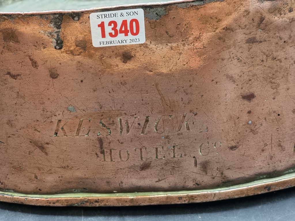 A large Victorian copper twin handled pan or kettle, inscribed 'Keswick Hotel Co', 57cm wide. - Image 2 of 4