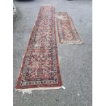 A large Persian runner, having floral central medallion, (a.f.), 490 x 94cm; together with a small
