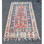A Kelim carpet, having star and geometric design, 192 x 117cm.