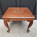A hardwood and brass inlaid low occasional table, 58.5cm wide.