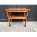 A walnut two tier occasional table, 76.5cm wide.