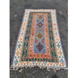 A Kelim rug, having geometric borders, 226 x 140cm.