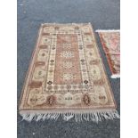 A Persian rug, having allover geometric design, 202 x 125cm; together with a small Persian rug,