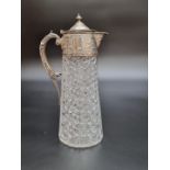 A Victorian silver mounted cut glass claret jug by Charles Edwards, London 1885, 28.5cm. (s.d).