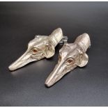 A pair of modern metal hound's head paper clips, 15cm.