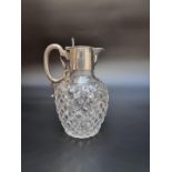 An Edwardian silver mounted hobnail cut glass claret jug, by The Goldsmiths & Silversmiths Company