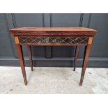 A late 18th century Italian mahogany and inlaid card table, 85.5cm wide, (a.f.).