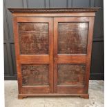 An 18th century oak press cupboard, incorporating 17th century Italian Cypress wood panels, 164cm