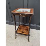 An unusual late 19th century Egyptian revival ebonized and inlaid occasional table, the top inset