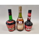 Three bottles of Liqueur, comprising: a 24 fl.oz. De Kuyper cherry brandy; a similar 50cl example;